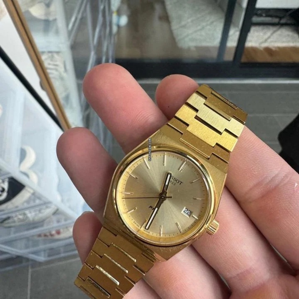 Tissot Gold Men's Watch with Date Display